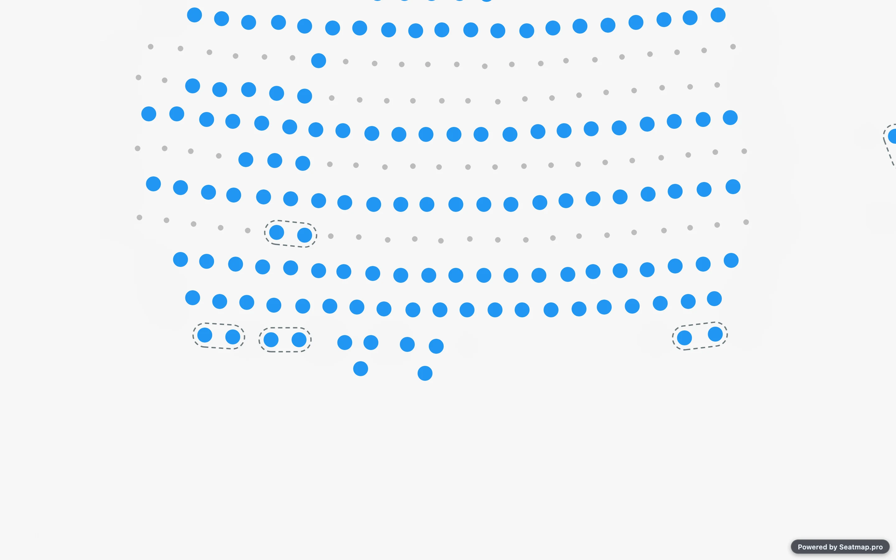 A seating map in the booking renderer with a dashed outline drawn around a pair of seats that have to be booked together